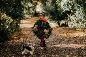 Kat, the Fabulous Florist, with a rather fabulous wreath.